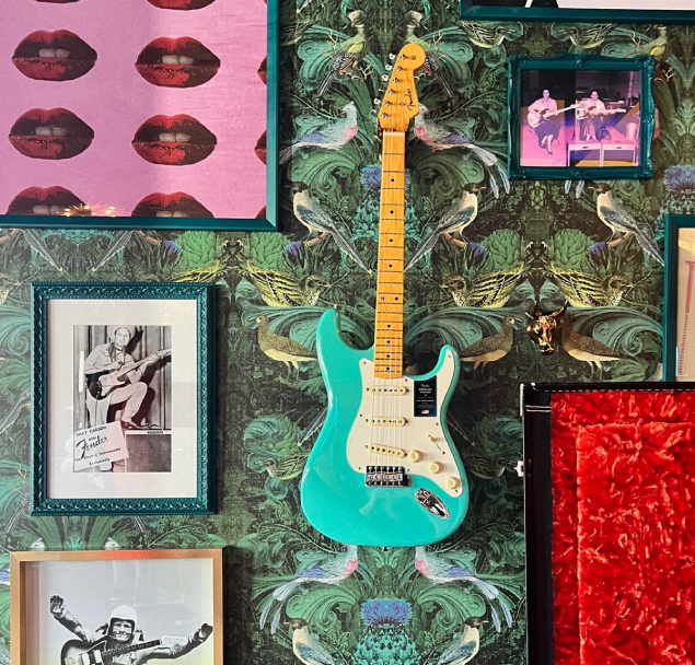 Wall art for the Fender House activation including a Fender guitar on the wall