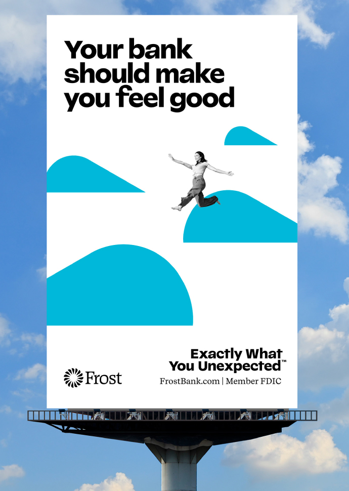 A photo of out of home design for Frost that features a woman walking on clouds and reads "Your bank should make you feel good. Exactly What You Unexpected"