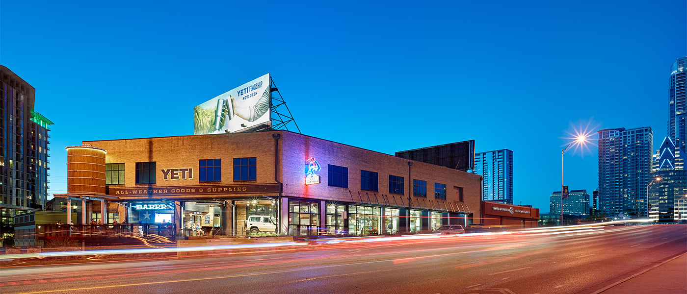 A night time lapse photograph of the YETI Flagship store