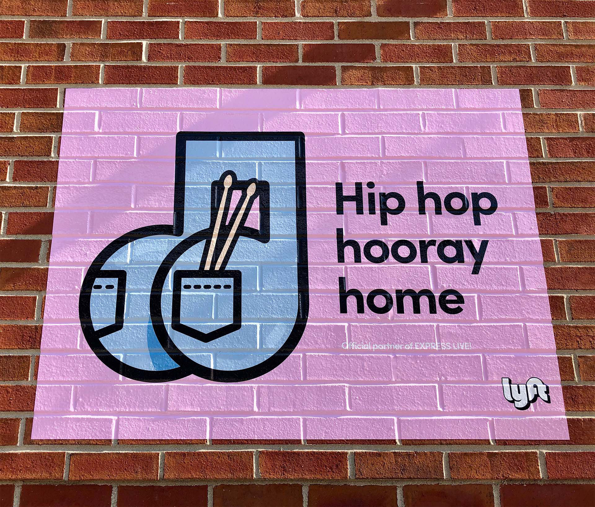 A close-up of a mural design for Lyft that reads "Hip hop hooray home"