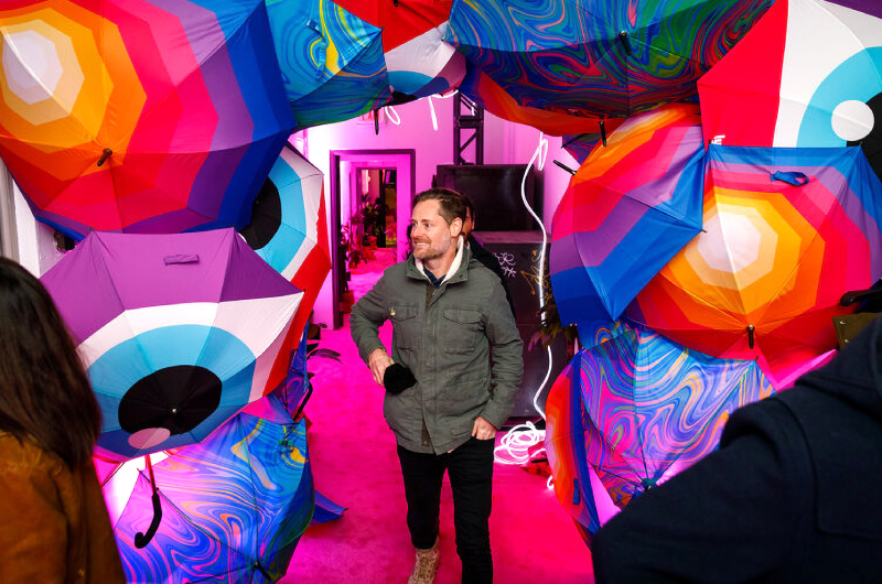 A photo of the Lyft Vancouver activation with custom umbrella designs