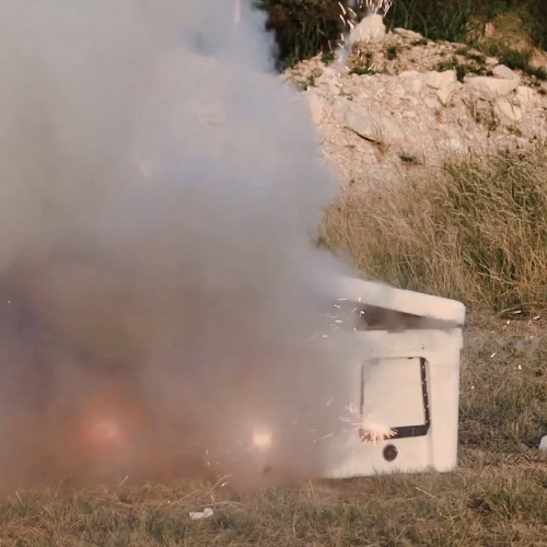 A video of fireworks exploding from a YETI cooler and the cooler remains in tact.