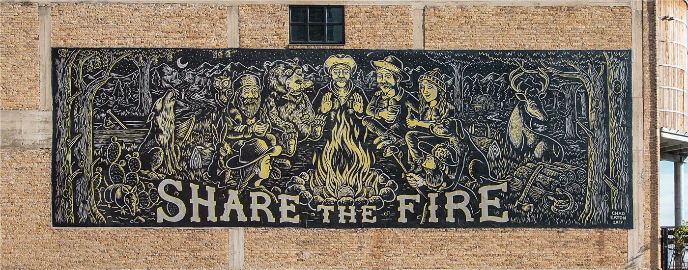 A wall mural design for YETI that reads "Share the fire"